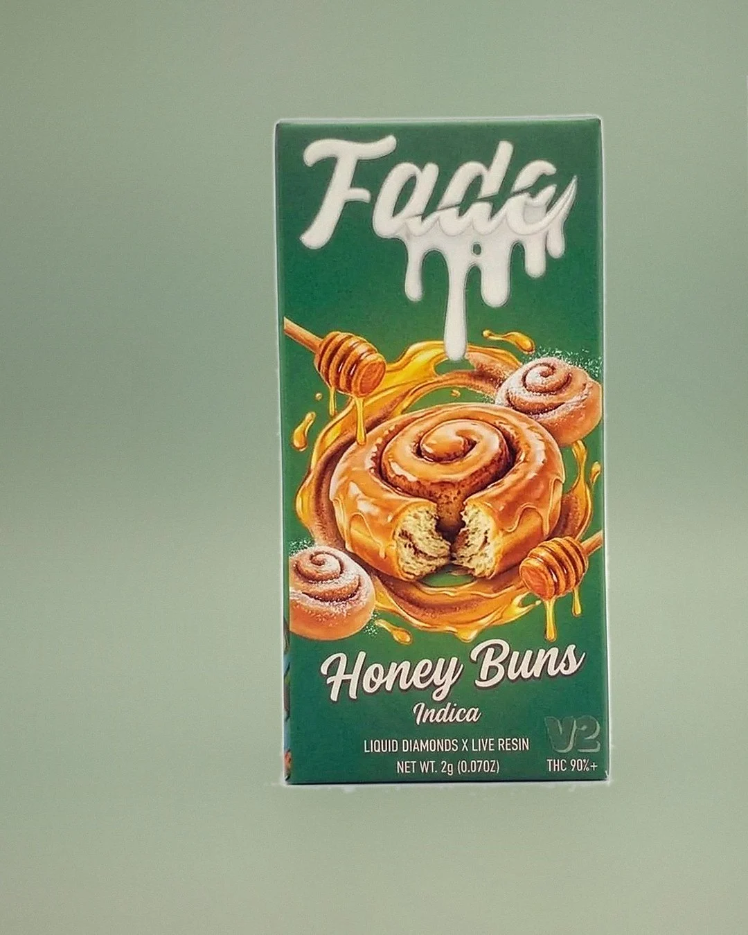 Fade 3-in-1 Honey Buns V2 green box with glazed cinnamon rolls and a honey dipper