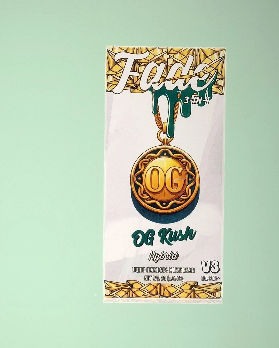 Fade 3-in-1 OG Kush V3 white box with a gold OG medallion and gold geometric border